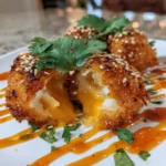 Crispy Seafood Poppers With Lime Chili Cilantro Cream Center 6 Crispy Seafood Poppers With Lime Chili Cilantro Cream Center 1772042221.4203994