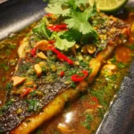 Grilled Sea Bass On Plancha With Savory Thai Sauce 6 Grilled Sea Bass On Plancha With Savory Thai Sauce 1772912018.1610172