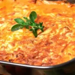 Überbackenes Hähnchen-Gyros in cremiger Tomaten-Paprika-Sauce 4 Überbackenes Hähnchen-Gyros in cremiger Tomaten-Paprika-Sauce